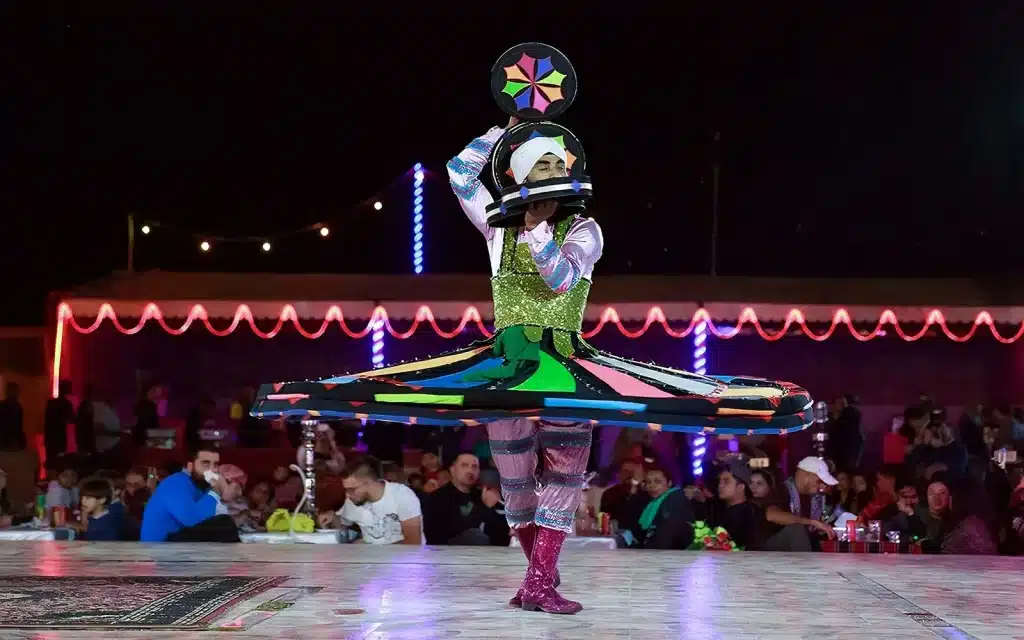 Dancer Performing tanoura Show at Desert safari and Guest are Enjoying it